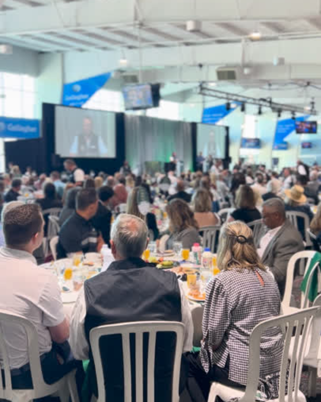 mayor on stage inside gallagher pavilion in front of 900 guests